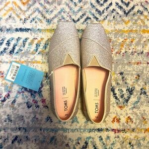 Tom’s size 9 Champagne Sparkle Flats